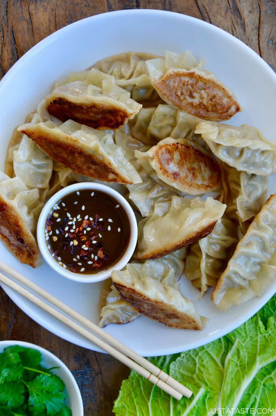 Pork Potstickers With Citrus Soy Dipping Sauce Just A Taste
