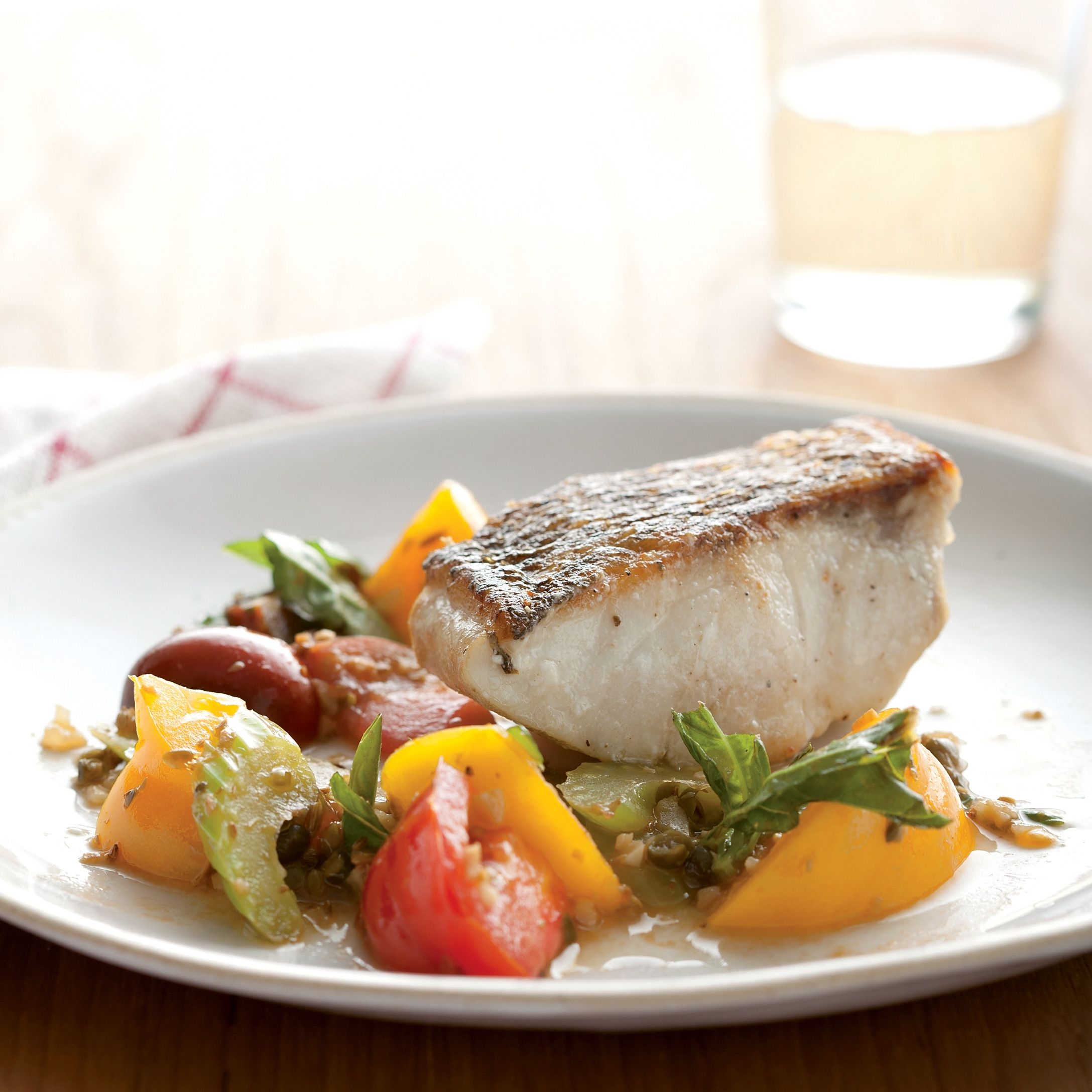 Striped Bass With Heirloom Tomato Scampi Recipe Epicurious